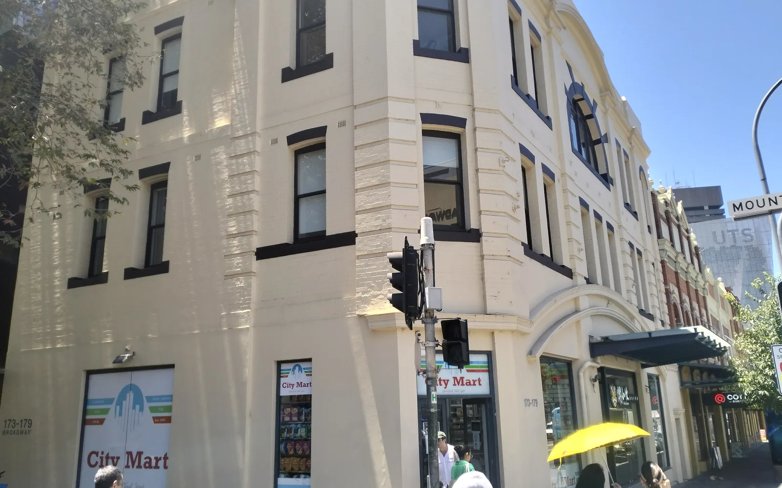 Historic theater building facade with ornate architectural details and marquee signage